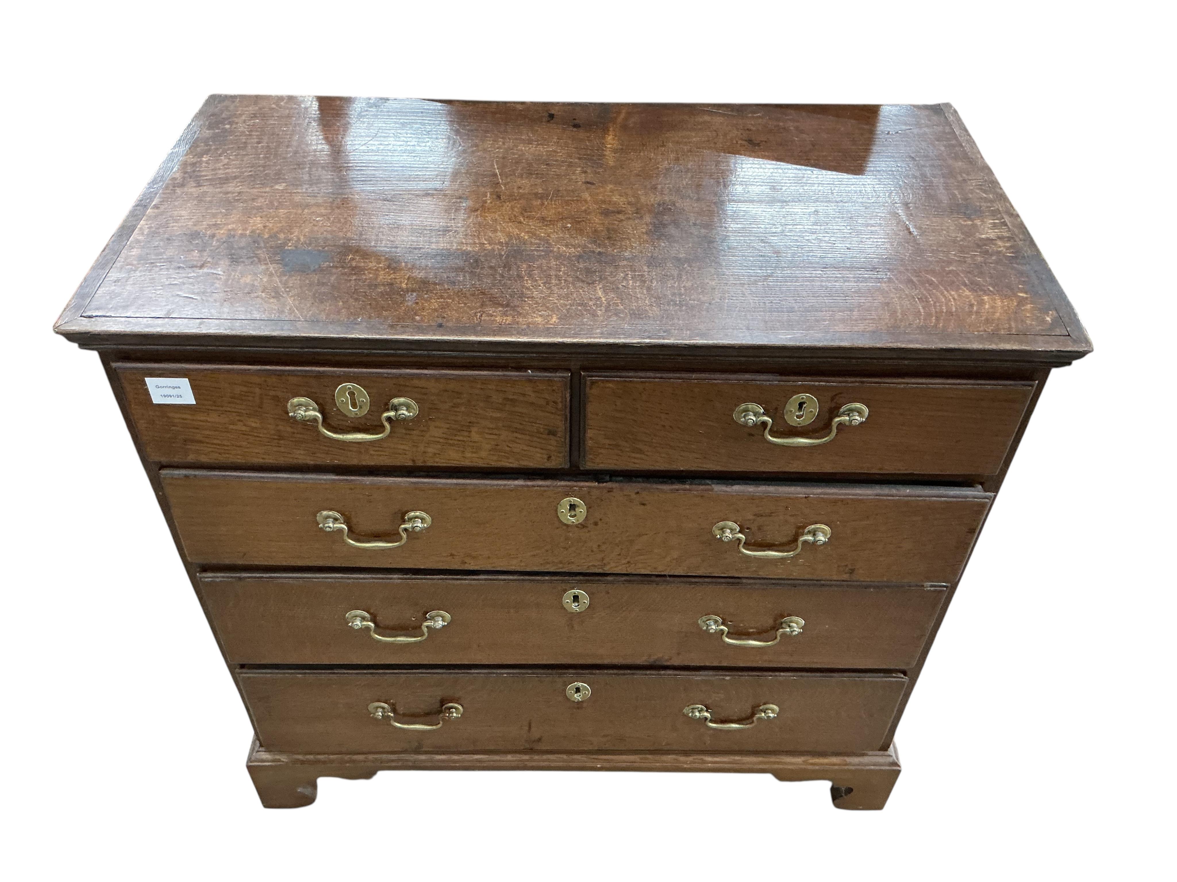 A George III oak chest of drawers, width 94cm, depth 49cm, height 91cm